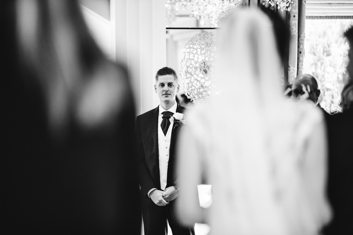groom seeing the bride for the first time at thornton hall hotel