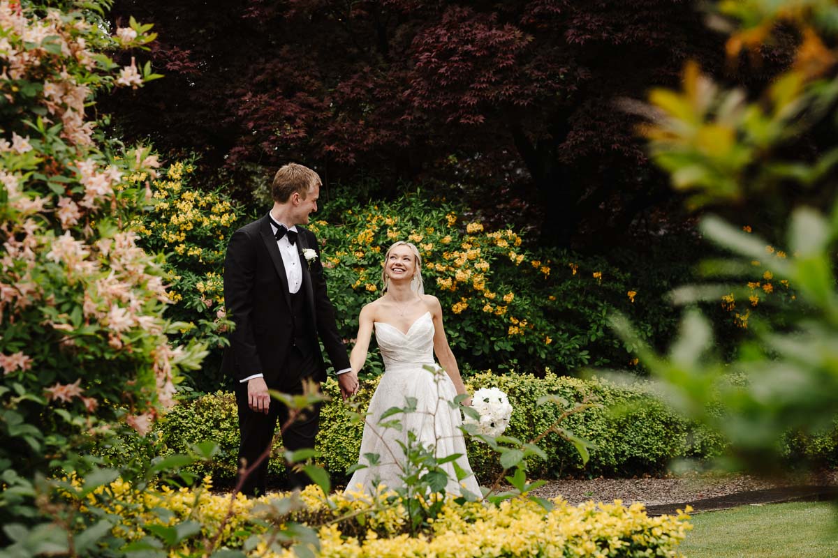 Bride and groom outside Eaves Hall Wedding Venue