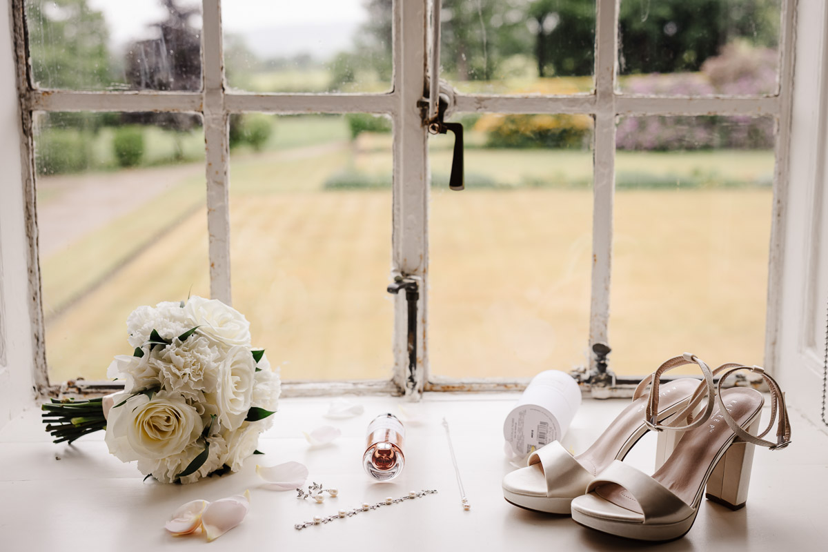 Bride and groom outside Eaves Hall Wedding Venue
