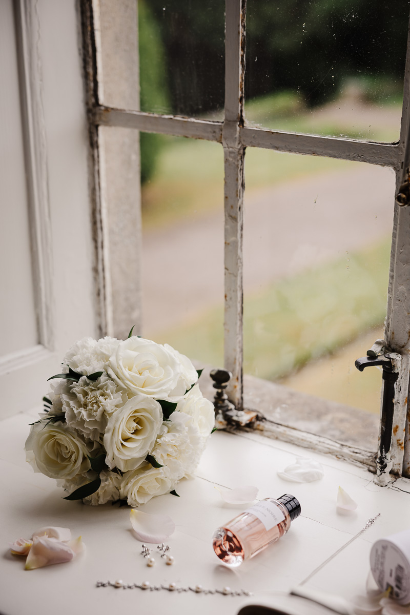 Bride and groom outside Eaves Hall Wedding Venue