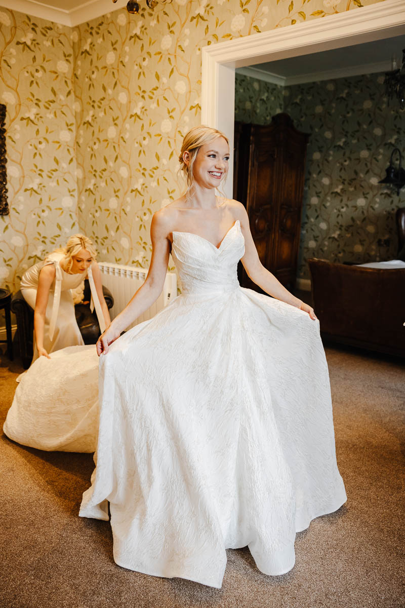 Bride and groom outside Eaves Hall Wedding Venue
