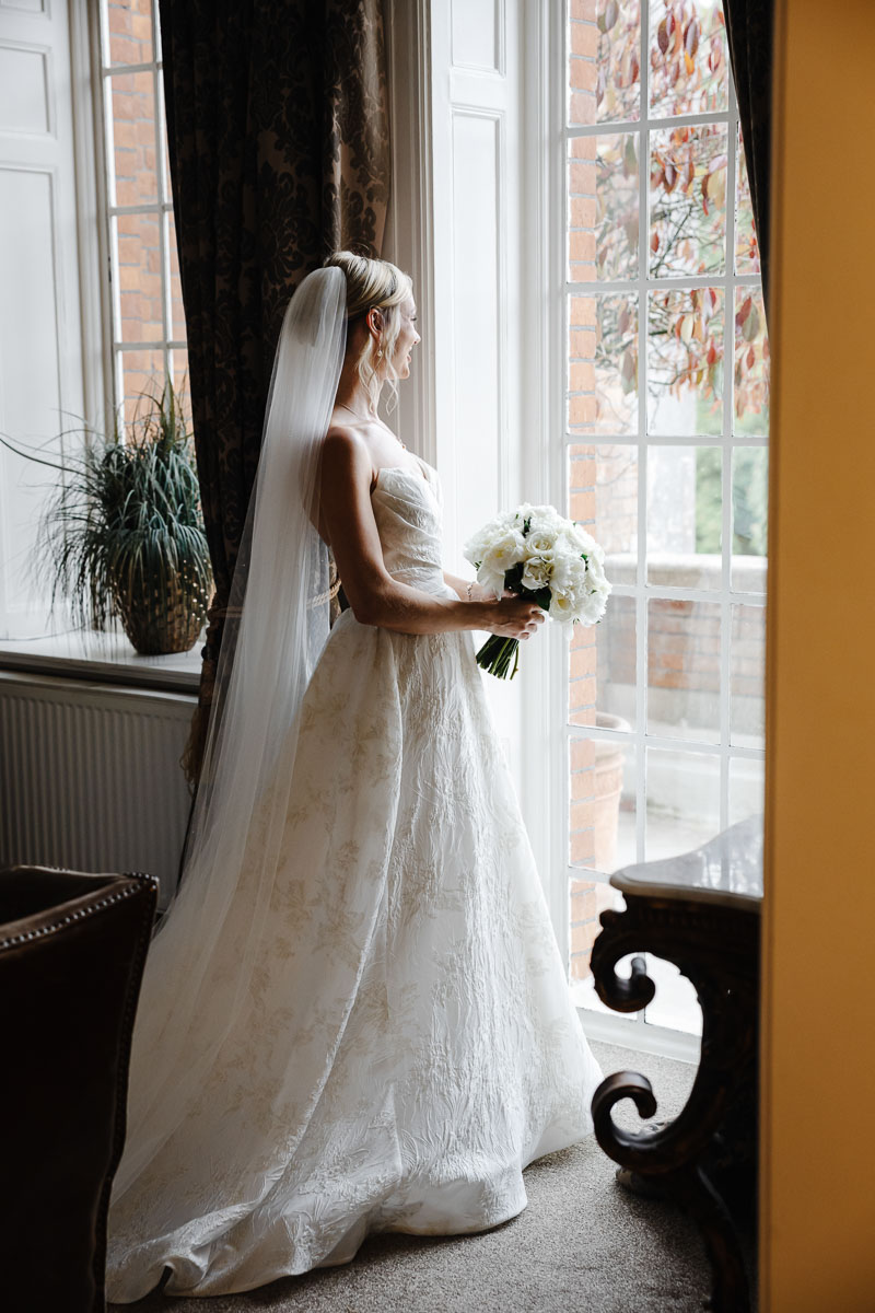 Bride and groom outside Eaves Hall Wedding Venue