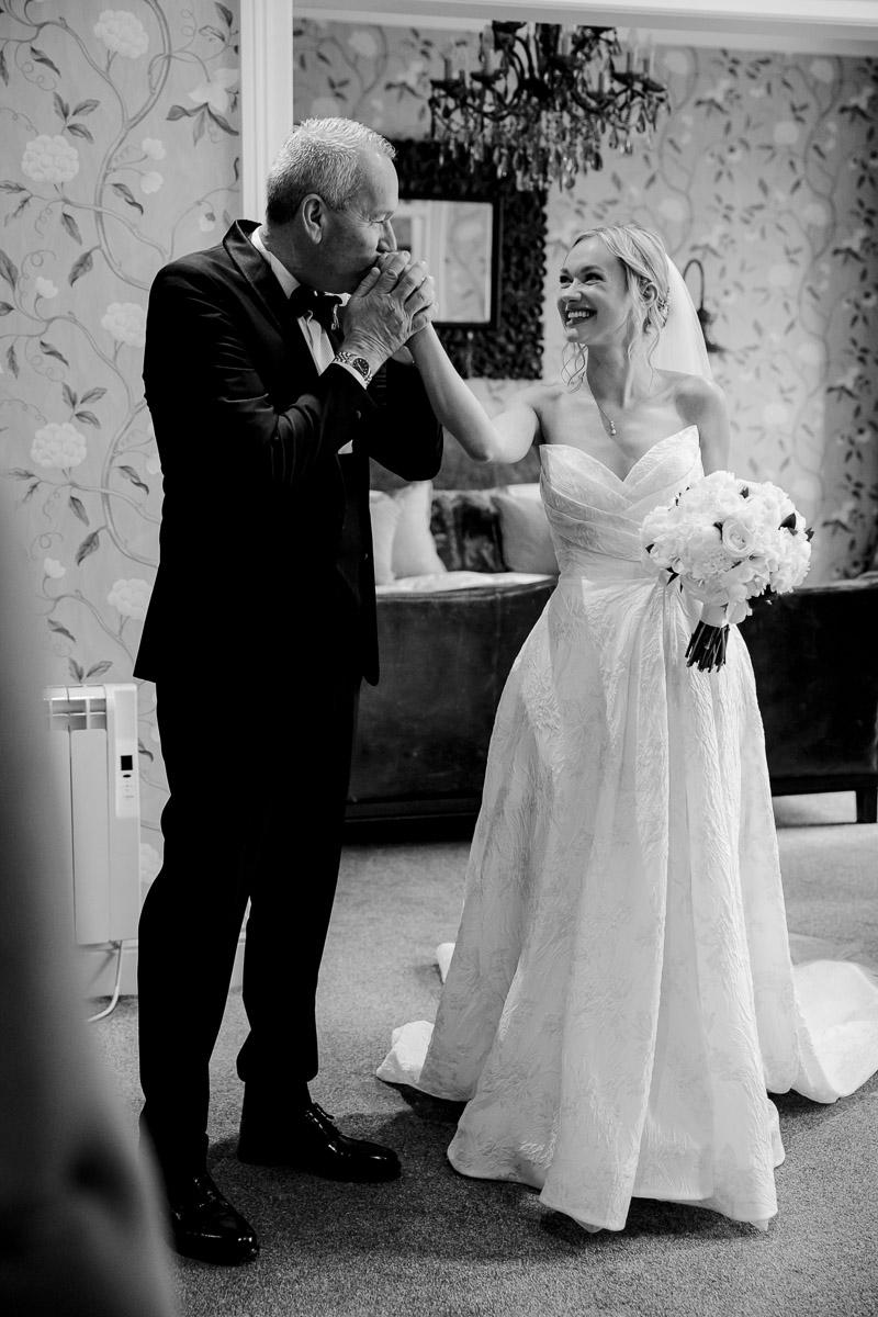 Guests celebrating on the lawn at Eaves Hall Wedding Venue