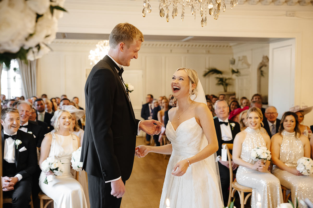 bride and groom during the ceremony at eaves hall wedding venue