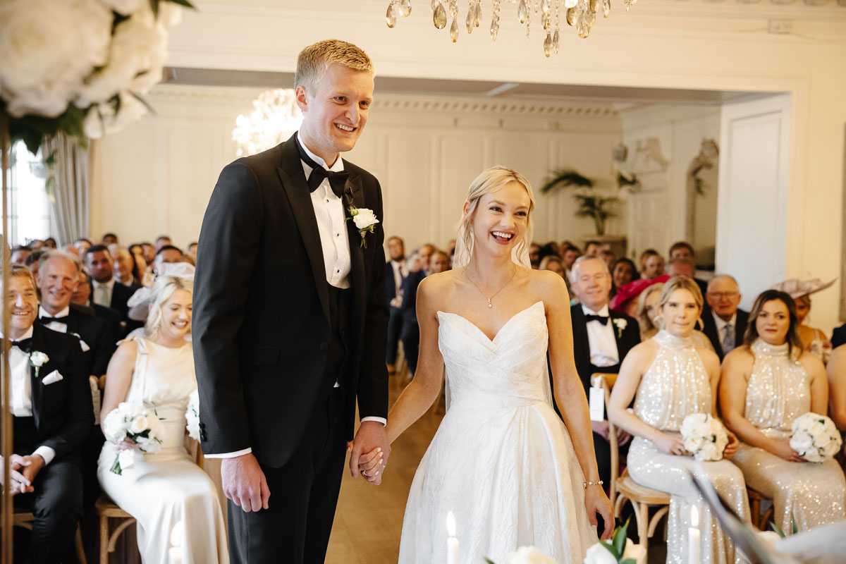 bride and groom during the ceremony at eaves hall wedding venue