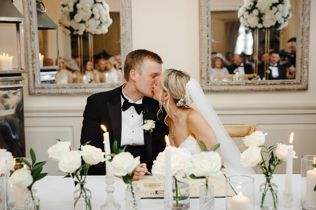 bride and groom during the ceremony at eaves hall wedding venue