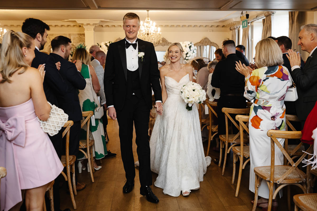 bride and groom during the ceremony at eaves hall wedding venue