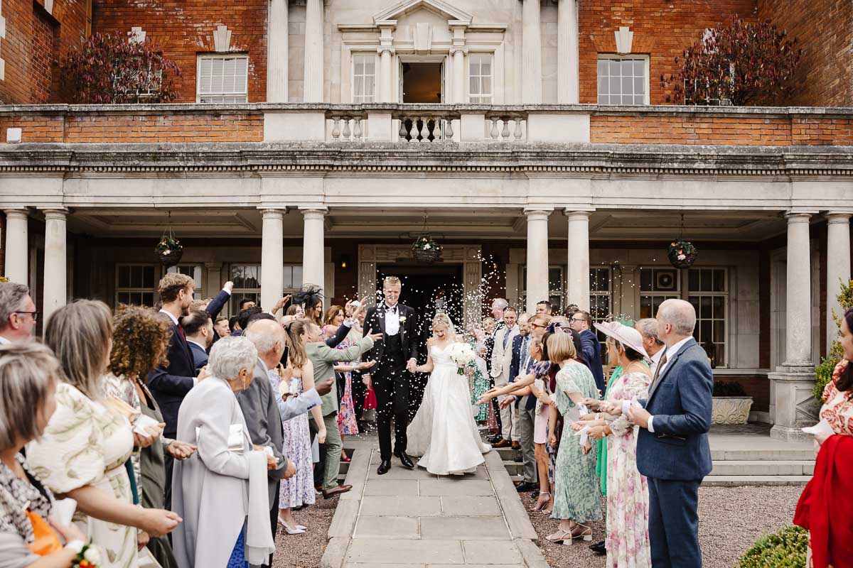 bride and groom during the ceremony at eaves hall wedding venue
