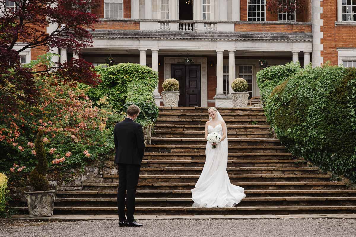 bride and groom during the ceremony at eaves hall wedding venue