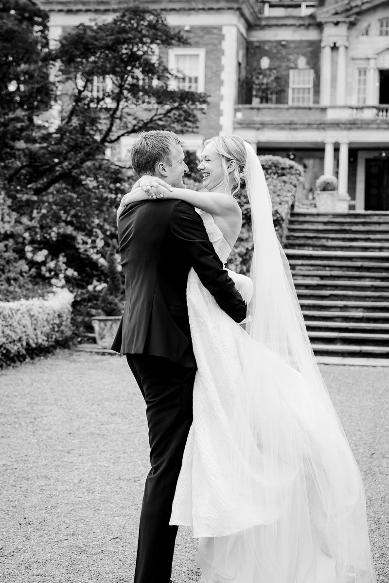 bride and groom during the ceremony at eaves hall wedding venue
